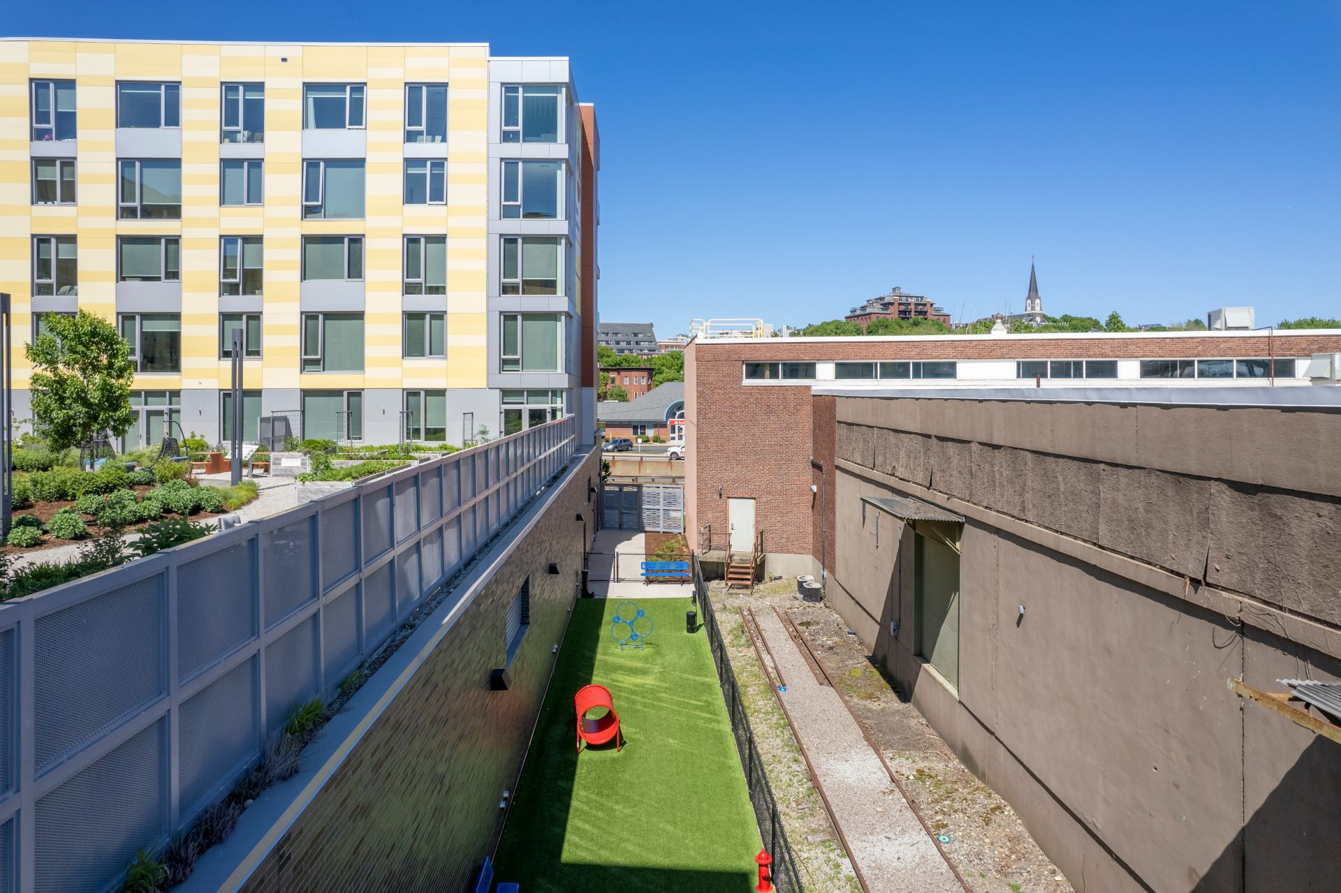 Dog run area in The Harvey exterior amenities